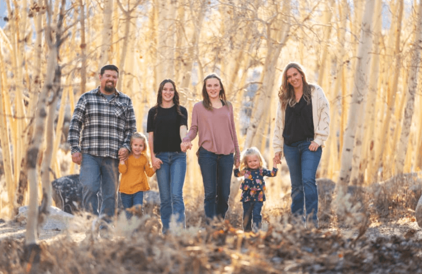 family supporting MPS advocacy has a portrait taken in the woods