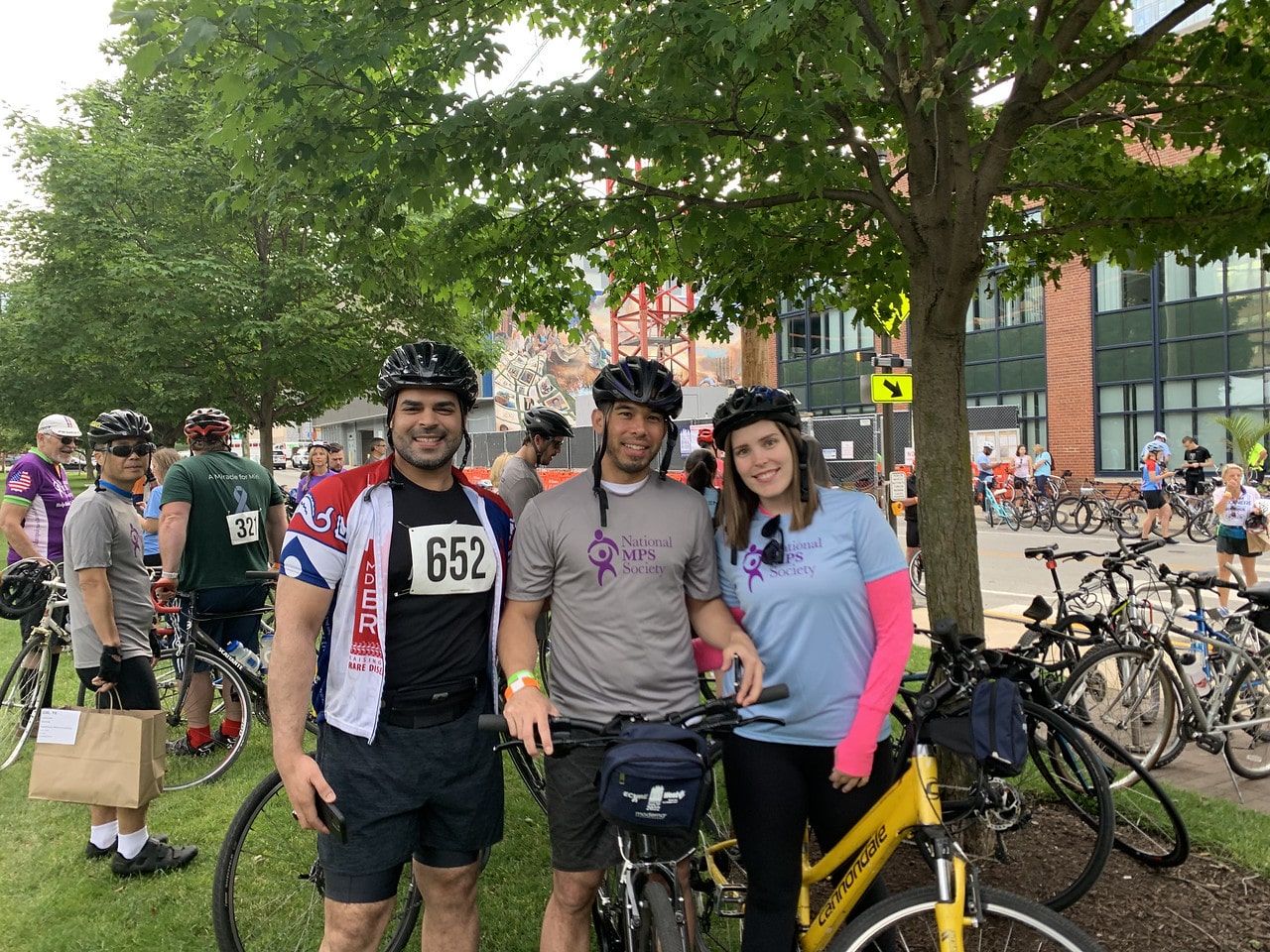 Three friends at a cycling race to raise funds for MPS