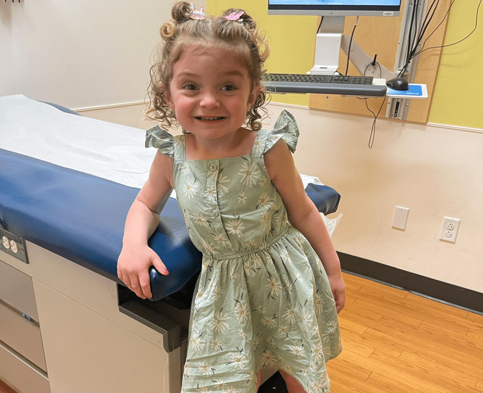 Little girl with Hurler syndrome in a doctor's office